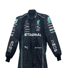 Close-up of the fabric and stitching on George Russell’s 2023 racing suit, revealing the intricate details and high-quality materials, with clear visibility of sponsor logos-Bestracewear