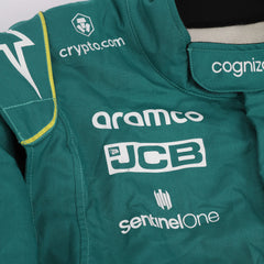 Close-up shot of Lance Stroll’s 2023 F1 racing suit fabric and stitching, focusing on the high-quality material and visible sponsor branding, emphasizing durability and race-ready functionality-Bestracewear