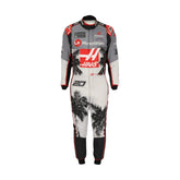 2023 Kevin Magnussen Miami GP F1 racing suit from Bestracewear, front view: navy blue base with red and white accents, featuring a prominent star design on the leg and subtle stripes in the background.