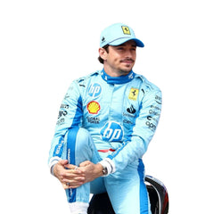 Close-up of 2024 Charles Leclerc miami GP F1 racing suit from Bestracewear, displaying the intricate blue material with yellow stitching and sponsor logos.