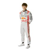 Yuki Tsunoda's 2025 Japanese Grand Prix f1 race suit front view, showcasing a predominantly white design with blue side panels and green accents around the shoulders. Bestracewear