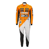 Lando Norris in the 2023 'Triple Crown' Spanish GP race suit featuring a tribute design with refined graphics and modern tailoring.Bestracewear