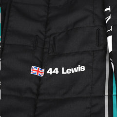 Close-up of Hamilton’s 2023 F1 suit detailing the fabric texture and fine stitching, with clear sponsor placements. Bestracewear