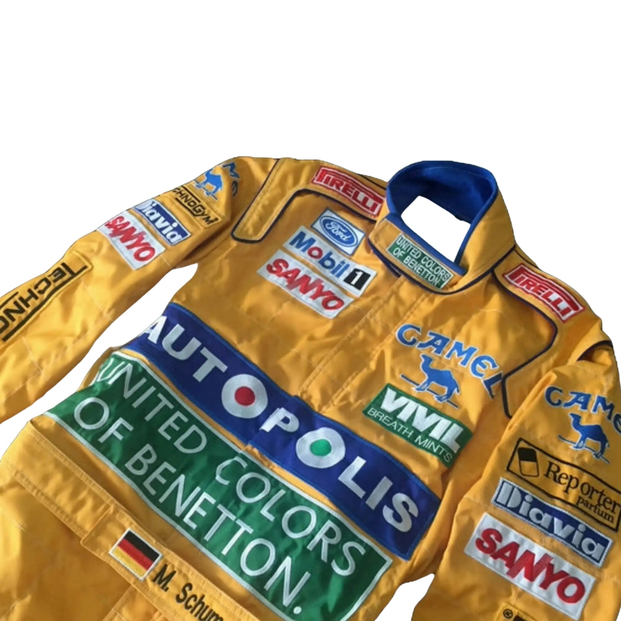 Close-up of the embroidered logos, stitching details, and breathable fabric textures from Michael Schumacher’s 1992 Benetton F1 racing suit.Bestracewear