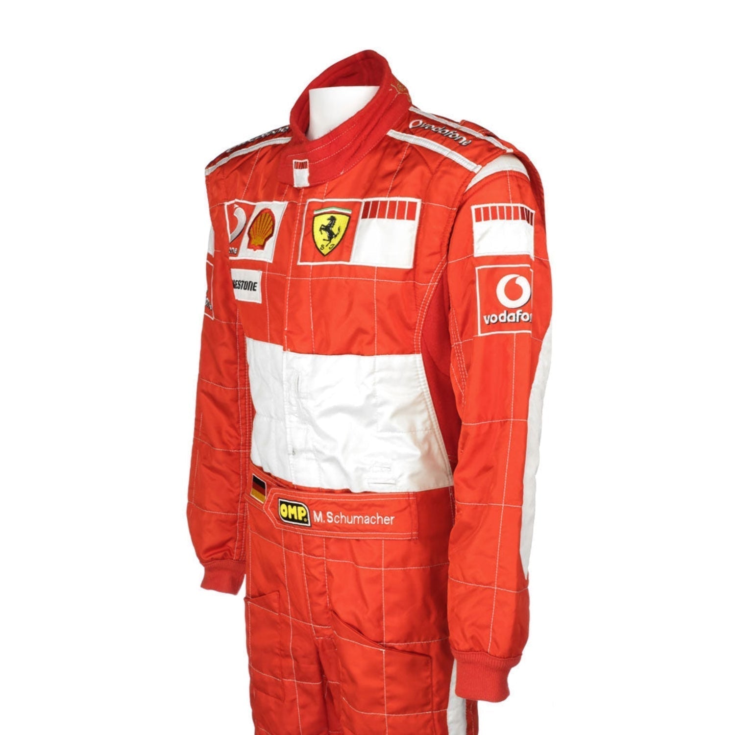 Side profile of the 2006 F1 suit worn by Michael Schumacher, featuring bright red fabric with sleek contouring and high-visibility white accents.Bestracewear