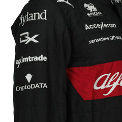 Close-up of Bottas' 2023 Japanese Grand Prix F1 racing suit fabric texture and stitched sponsor logos, detailing the high-quality materials and the integration of the black, red, and white color palette.