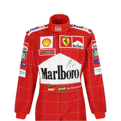 Close-up of Schumacher’s 2004 F1 suit, showing high-quality red fabric, tight white stitching, and finely printed sponsor details true to the original.2004MichaelSchumacherF1RacingSuit_Bestracewearlica