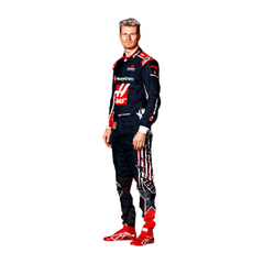 Side profile of Nico Hülkenberg in his 2023 Austin Grand Prix racing suit, highlighting the ergonomic fit and the interplay of navy blue and red fabrics, enhanced by subtle star-themed detailing along the side seams.