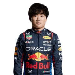 Yuki Tsunoda in action during the 2025 Abu Dhabi Grand Prix at Yas Marina Circuit, wearing his special edition blue race suit with red accents. bestracewear