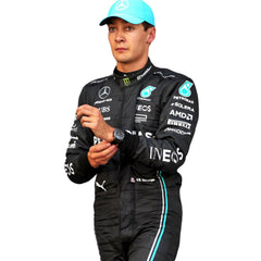 Close-up of the fabric and stitching on George Russell’s 2023 racing suit, revealing the intricate details and high-quality materials, with clear visibility of sponsor logos.Bestracewear