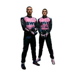 Jack Doohan and Pierre Gasly standing side by side in their 2025 Alpine F1 racing suits, showcasing the team's design and unity.

