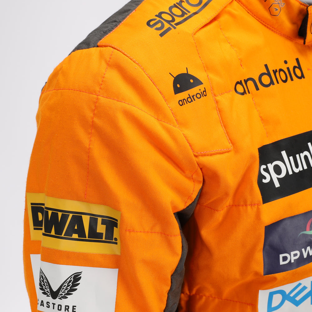 Close-up of the special edition Spanish GP racing suit showcasing premium fabric texture and subtle commemorative graphics.Bestracewear