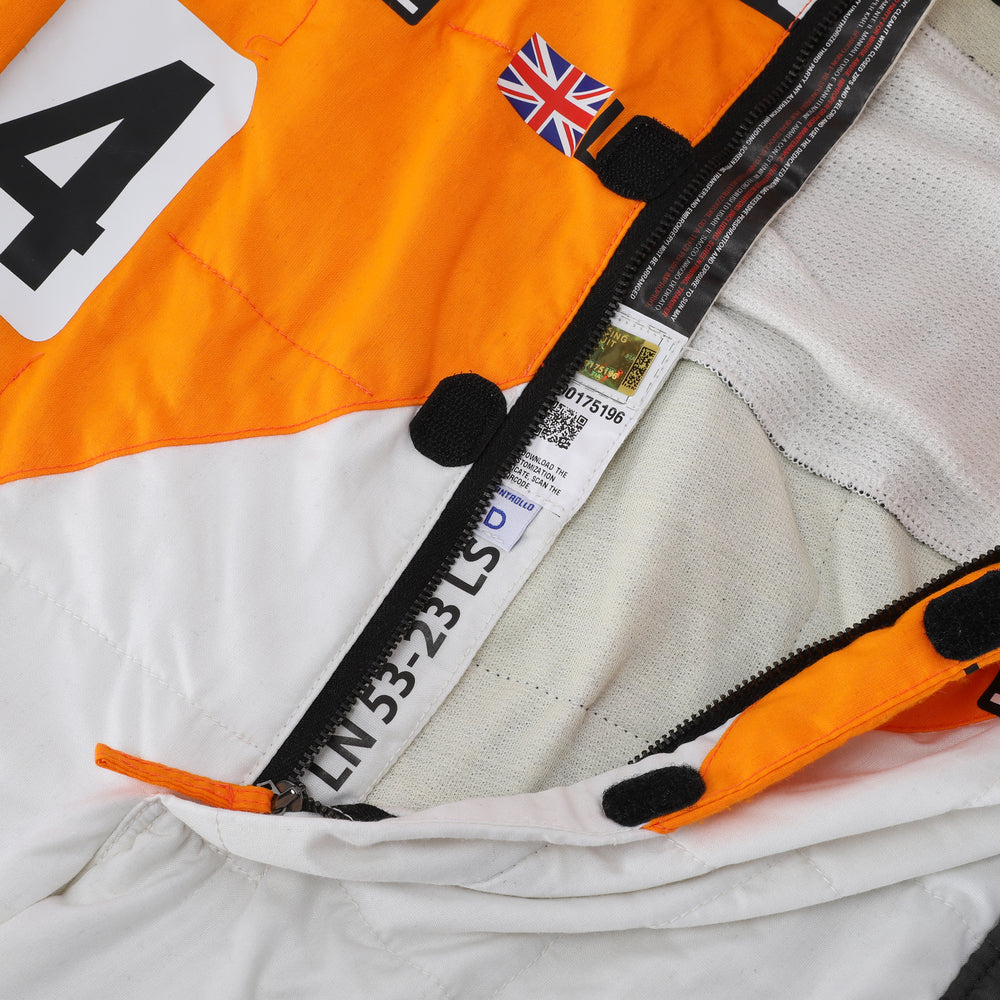 Close-up of the special edition Spanish GP racing suit showcasing premium fabric texture and subtle commemorative graphics.Bestracewear