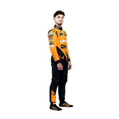 Lando Norris standing confidently in his 2024 F1 racing suit, front view showcasing a vibrant papaya orange base with contrasting black panels and subtle detailing along the chest and arms.