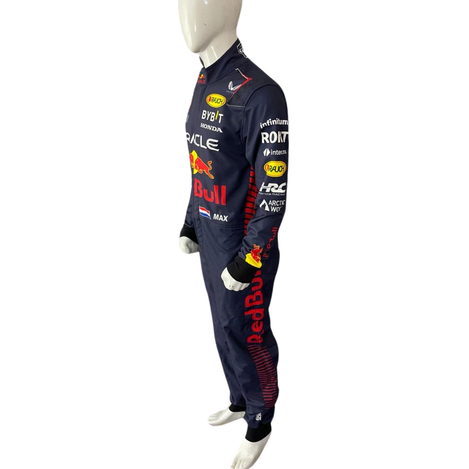 Side angle showing Verstappen’s navy blue race suit with dynamic red accents along the torso and yellow detailing around the sleeves.Bestracewear