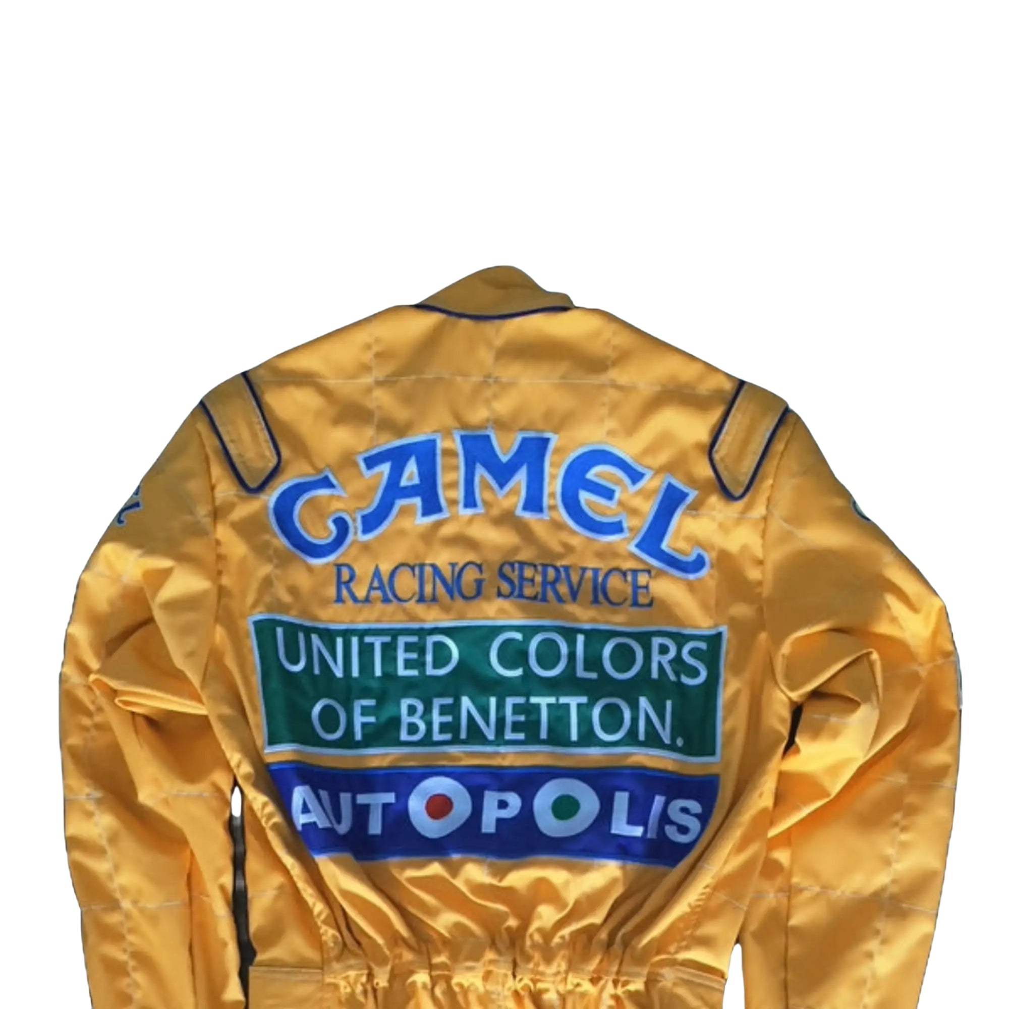 Back side of the 1992 Formula 1 suit worn by Michael Schumacher, showcasing era-specific sponsor logos and reinforced fabric seams for safety.Bestracewear
