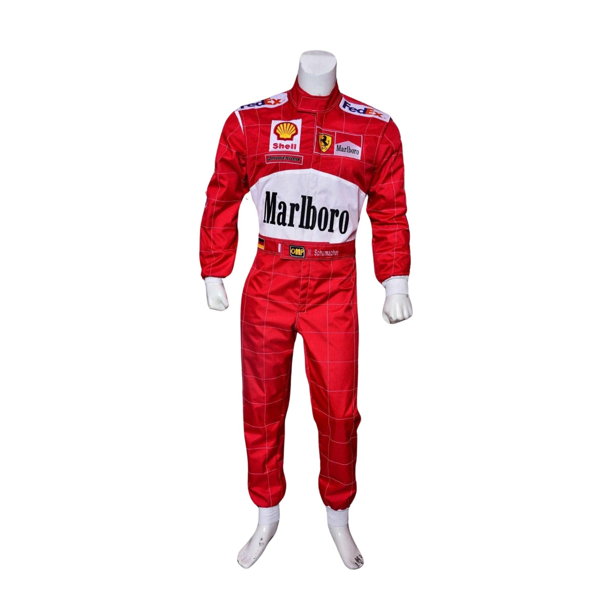 Front view of Michael Schumacher’s 2000 F1 race suit, featuring Ferrari red with white accents and sponsor logos that define his first world championship with the team.Bestracewear