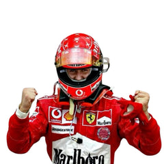 Close-up of the 2005 Schumacher suit highlighting fine embroidery, Ferrari red color tone, and precise stitching on race-worn sponsor badges.Bestracewear