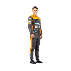 Left Side profile of Piastri’s 2023 F1 suit showing ergonomic fit, aerodynamic paneling, and detailed branding elements.Bestracewear
