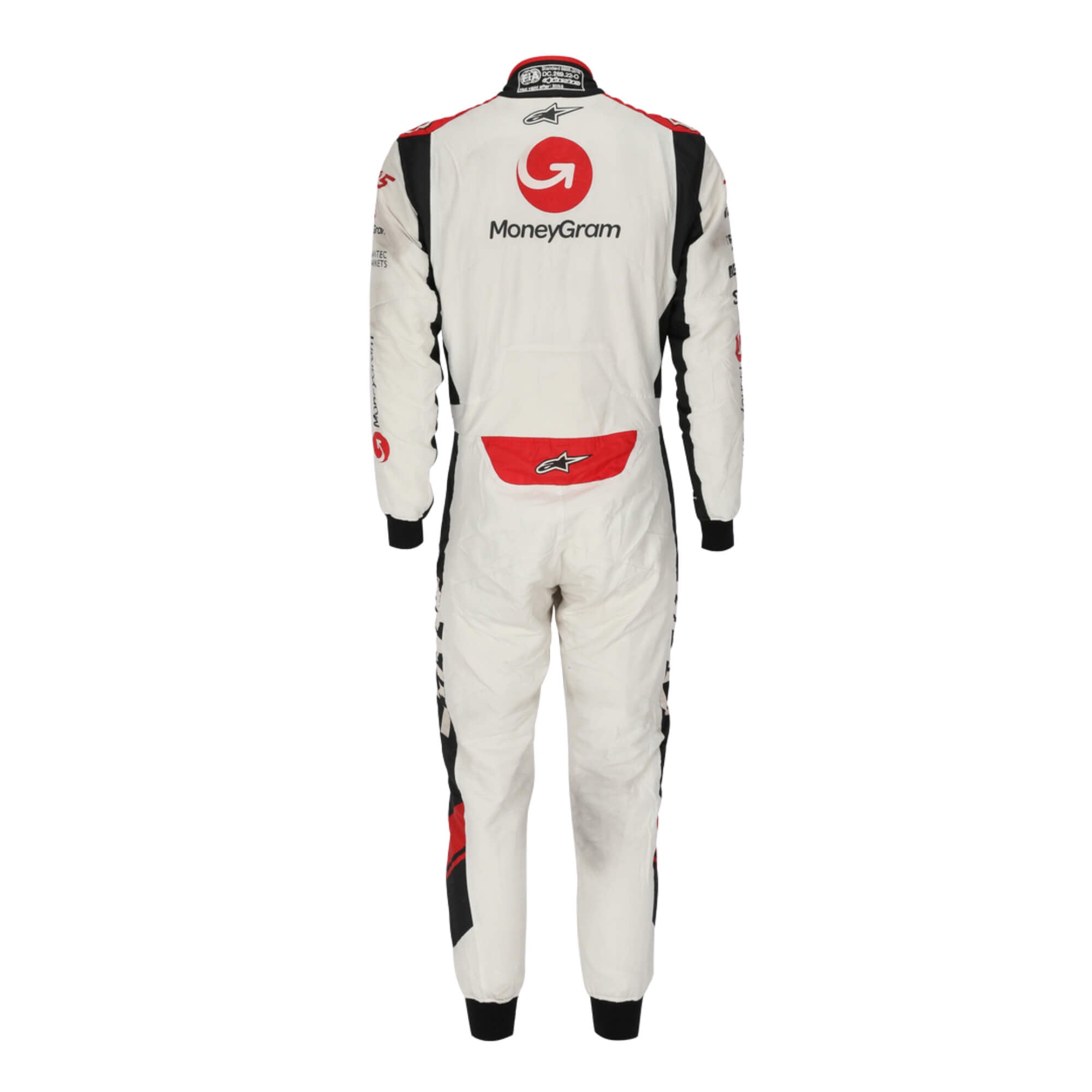 Back view of Kevin Magnussen’s 2017 signed F1 racing suit, highlighting sponsor embroidery and aerodynamic design for Formula 1 racing.